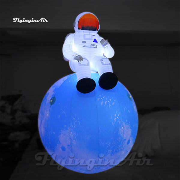 Figura Inflable de Astronauta con Luz sobre Base Lunar Azul - Decoración Luminosa para Fiestas y Escenarios